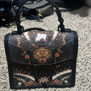 Aldo Black and Gold Mini Bag with Intricate Design